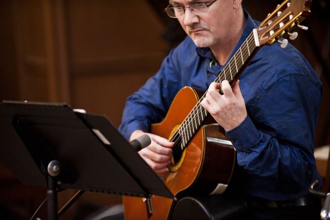 Dave Milliken plays classical guitar at the wedding of Karla Fraser